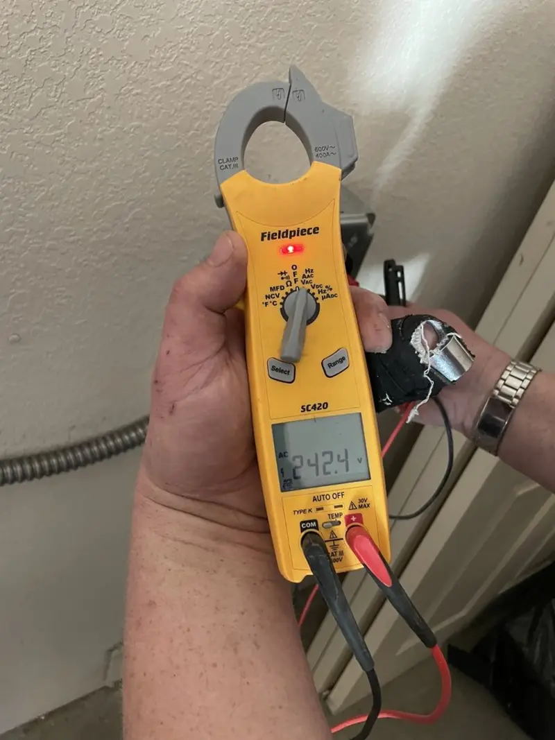 Voltage testing with clamp meter during Generator Installation in Folsom